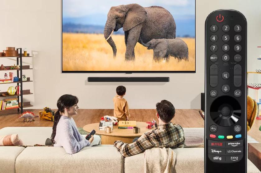 Family watching LG QNED TV using Magic Remote